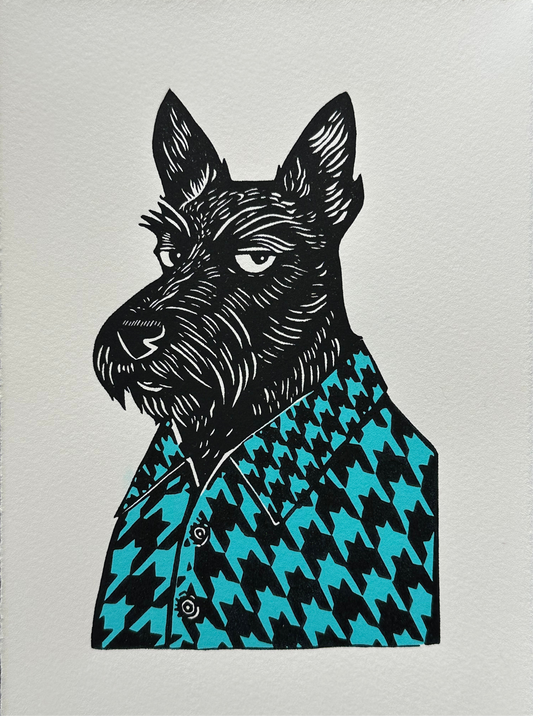 Black and white linocut print of a Scottish terrier wearing a houndstooth-patterned coat in blue, showcasing bold textures and classic design.